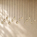 Ecletant Linear Chandelier 72’’ - Lacquered Burnished Brass